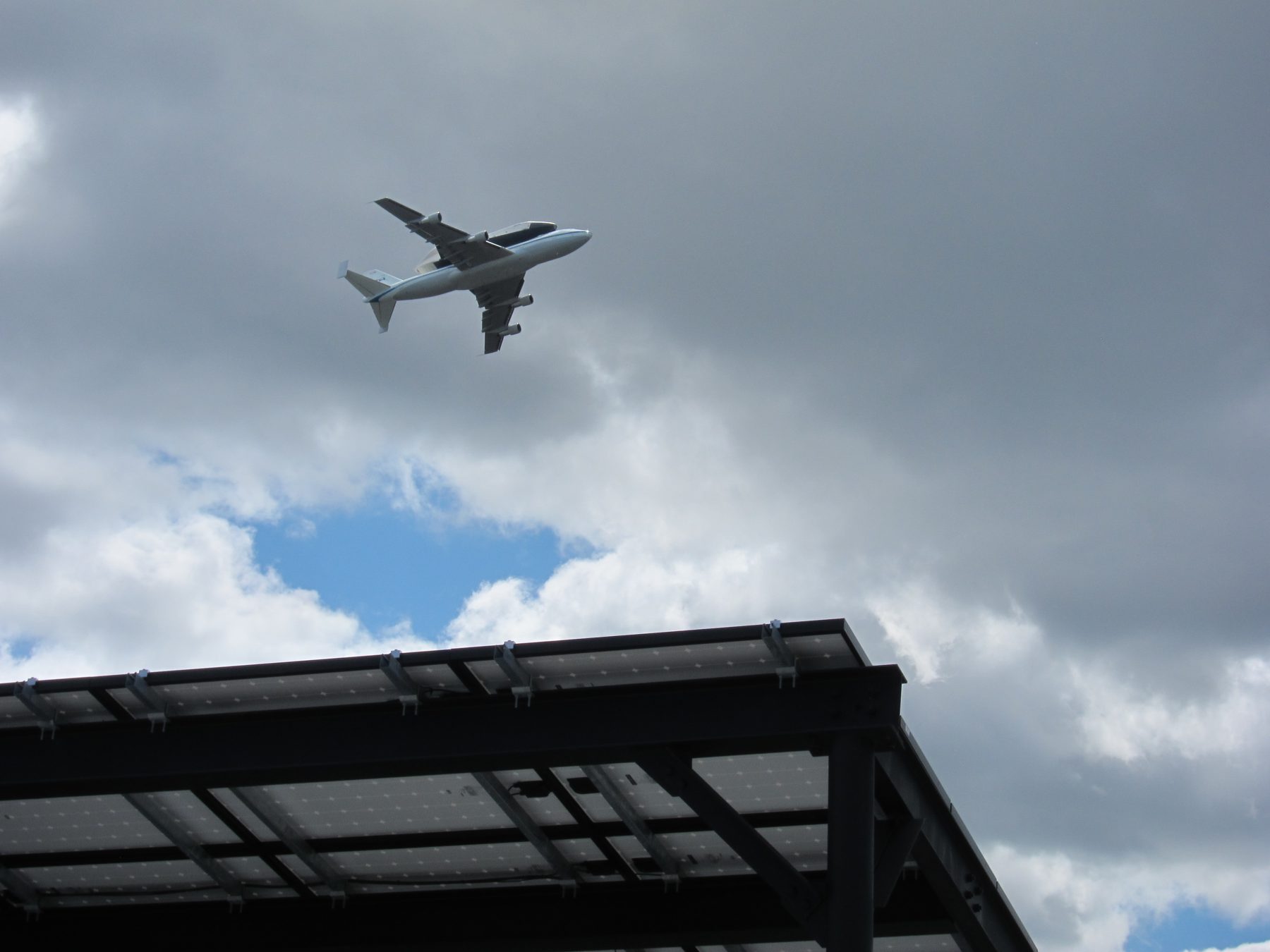 Space Shuttle Enterprise flies over Gateway Elton solar installation
